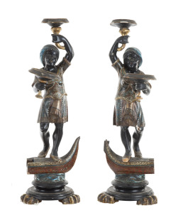 A pair of Italian Blackamoor pedestals, original polychrome finish on carved timber, 19th century, 84cm high