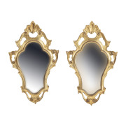 A pair of Italian portico mirrors in shaped gilt frames, mid 20th century, 55cm x 33cm