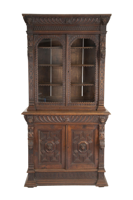 A Continental bookcase, ornately carved oak in the Renaissance style, 19th century, ​227cm high, 115cm wide, 48cm deep