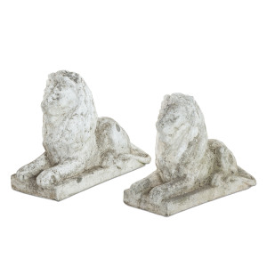 A pair of lion garden sculptures, reconstituted stone, 19th century, 50cm high, 63cm long