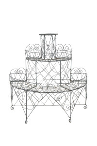 An English wire work plant stand, late 19th century, 105cm high, 110cm wide, 60cm deep