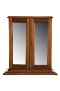 A small mirrored two door cabinet, interior fitted with drawers and pigeon holes, walnut, circa 1885, 57cm high, 53cm wide, 28cm deep