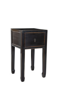 A Chinese single drawer bedside table with ebonised finish, 20th century, 70cm high, 40cm wide, 40cm deep