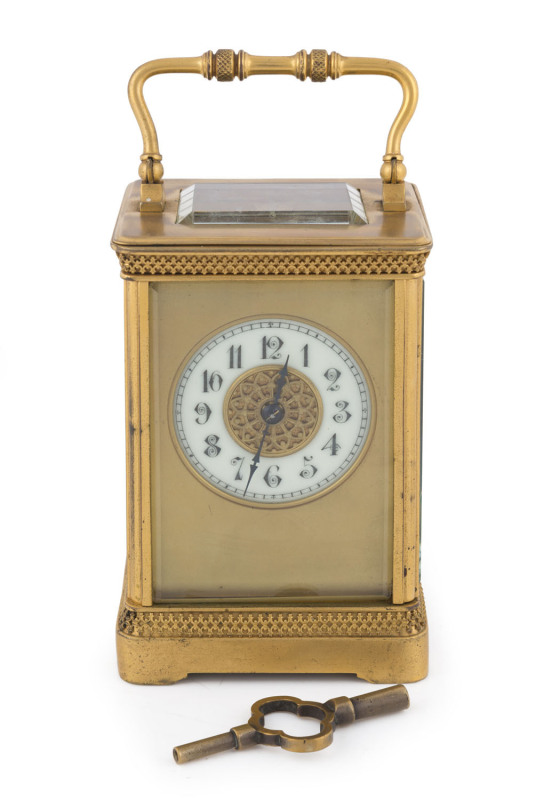 A French carriage clock, time and strike, brass case with Arabic numerals, late 19th century, ​18cm high