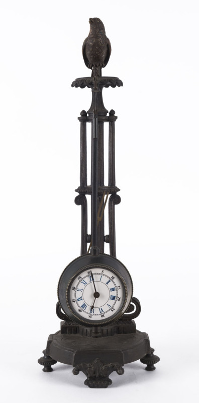 A Mystery clock, cast metal with bird finial, 20th century, ​40.5cm high PROVENANCE The Tudor House Clock Museum, Yarrawonga