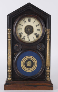 INGRAHAM CLOCK Co. "Doric" American parlor clock, 8 day movement with alarm in walnut case, circa 1860, ​41cm high PROVENANCE The Tudor House Clock Museum, Yarrawonga