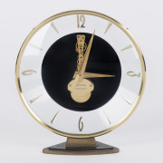 KAISER Skeleton clock in transparent circular case, mid 20th century, ​17cm high