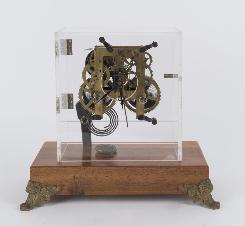 INGRAHAM display movement in perspex case, strikes on the hour and the half, 30cm high