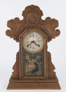 INGRAHAM "Urania" gingerbread parlor clock, 8 day movement with calendar dial, circa 1907, ​57cm high