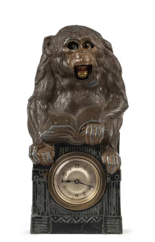 A German animated monkey timepiece, cold painted metal case with moving eyes and mouth, circa 1900, 24cm high PROVENANCE The Tudor House Clock Museum, Yarrawonga