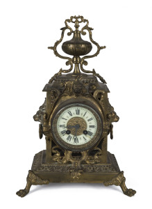 A French ornate cast brass cased mantel clock with time and strike movement and Roman numerals, 19th century, ​39cm high