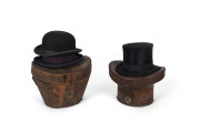 Antique top hat in original leather case together with two bowler hats, one in original leather case, 19th century,