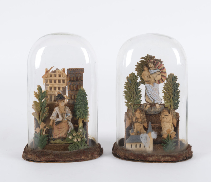 A pair of antique wax model dioramas in original glass domes, early 19th century, 22cm overall