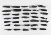 Thirty five assorted folding pocket knives, horn, timber and plastic handles, English, German, Portuguese and others, 19th and 20th century, the largest 21cm long