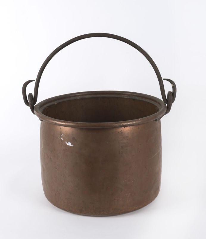 An antique copper pot with iron handle, 19th century, ​43cm across the handle