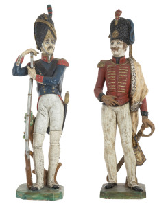 A pair of Napoleonic style chalk ware statues with hand painted finish, late 19th/early 20th century, ​98cm high