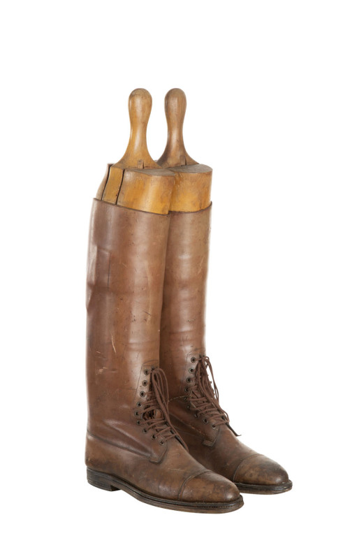 A pair of antique leather riding boots with original timber boot lasts, 19th century, ​63cm high