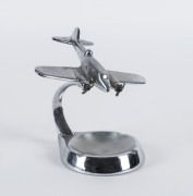 A chrome aeroplane ashtray, circa 1940, ​15cm high