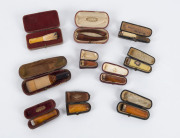 Ten cigar holders, amber and meerschaum with gold and silver mounts, all in original fitted leather cases, 19th and early 20th century, the largest 10.5cm long