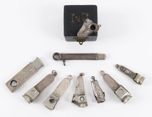 CIGAR CUTTERS, group of nine with sterling silver and Continental silver handles, 19th and early 20th century, ​the largest 9.5cm long