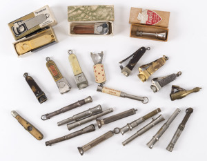 CIGAR CUTTERS and PRICKERS including silver handles and novelty examples, 19th and 20th century, the largest 8cm high, (23 items)