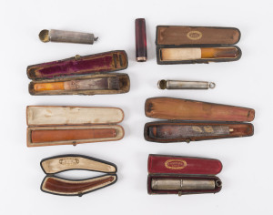 CIGAR HOLDERS in cases, amber, meerschaum, sterling silver and gold, 19th century, ​the largest 13cm long