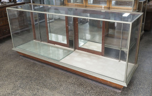 Shop counter display cabinet, circa 1920, 98cm high, 217cm wide, 57cm deep