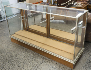 Art Deco nickel bound counter display cabinet, circa 1920, ​96cm high, 184cm wide, 54cm deep