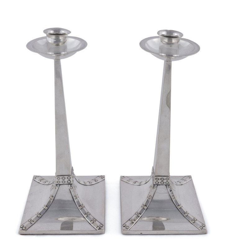 James Dixon & Sons pair of English Arts and Crafts silver plated candlesticks, in the style of Christopher Dresser, 19th century, 22cm high