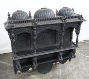 Anglo-Indian wall mounted shelves, ornately carved in ebony, 19th century, 110cm high, 102cm wide, 24cm deep