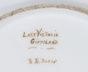 BLANCHE B. DAVIS [Australia, 1858 - 1933] A collection of six plates and four compote stands, c1907. Hand-painted porcelain, each signed and titled verso, 21cm diameter (plates); 22cm diameter (compote stands). - 2