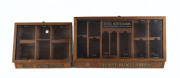 HENRI WINTERMANS: Two shop display point of sale cigar humidors, mid 20th century, the larger 61cm across