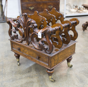 An English Canterbury, burr walnut on brass castors, circa 1860, ​52cm high, 51cm wide, 36cm deep