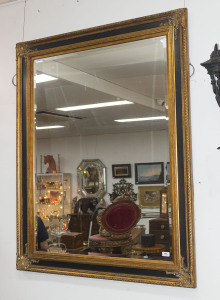 A gilt framed mirror with beveled glass, 20th century, 115cm x 146cm