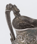 A Burmese silver jug with high relief repousse work, 19th century, ​18cm high, 370 grams - 8