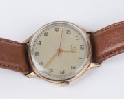 An OMEGA Gents manual wristwatch in rose gold case, with original omega box, circa 1950s - 2