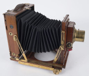 HOUGHTON mahogany & brass ½-plate field camera, double extension J.H. Dallmeyer No.5, Series 4 Carfac 6.3/f10" (25.5cm) lens (#81845) mounted on a Thornton Pickard shutter; replacement bellows. - 6