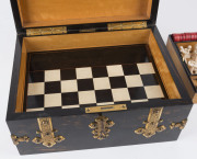 An impressive antique games box, coromandel and satinwood with brass fittings. Interior fitted with compartments, lift out tray and double-sided games board. Includes a fine array of carved bone and ivory gaming pieces comprising chess, draughts and backg - 7