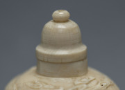 A Chinese snuff bottle with dragon motif, carved ivory, 19th century, ​6cm high - 7
