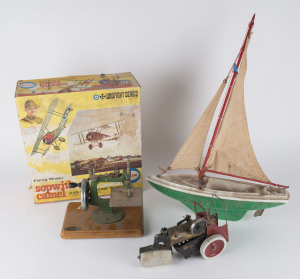 Grain English toy sewing machine, steam roller, Sopwith Camel .049 Gas Engine Powered flying model and a pond yacht, 20th century, the sewing machine 22cm high