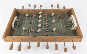 Vintage table soccer game; together with a vintage folkart pinball game, mid 20th century, ​the pinball 76cm high