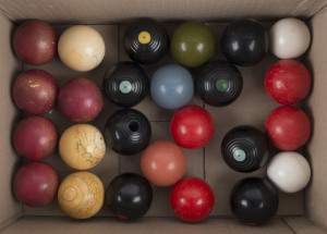 Group of 25 antique and vintage billiard balls and carpet bowls, 19th and 20th century,