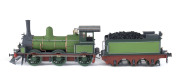 c.1875 Q Class (Q83) Steam Locomotive (195x35x50mm), green livery with gold trim, 0-6-0 wheel configuration, with rolling stock comprising two 'D' class Guard Vans and four freight wagons containing aggregate, total size 700x35x50mm. (8 items) - 2
