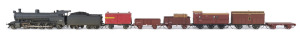 c.1928 N Class (N110) 'Pacific' type Steam Locomotive (275x40x55mm) built at the Newport Workshops, black livery, 2-8-2 wheel configuration, rolling stock configured for 1940s main line broad gauge use with five goods carriages including an Explosives van and Z guard carriage at the back, total size 780x40x55mm. (8 items)