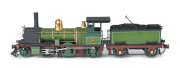 c.1894 G Class (G38) Steam Locomotive (185x35x50mm) built at the Newport Workshops (name plate on cabin), pale green livery with gold plate trim, 4-4-0 wheel configuration, with rolling stock comprising six goods carriages including 2000 gallon water tank - 2