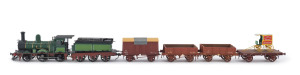 1872 No 100 Steam Locomotive (190x35x50mm) built at the temporary Williamstown Workshops and destined to haul the Commissioner's Train, dark green livery with gold trim, 2-4-0 wheel configuration, with rolling stock comprising four wagons, one open wagon containing a Bendigo baker's delivery cart, total size 480x35x50mm. (6 items)