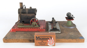 MAMOD donkey engine with Wilsco accesories and Mamod fuel tablets, mid 20th century, ​mounted on board 39cm wide