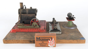 MAMOD donkey engine with Wilsco accesories and Mamod fuel tablets, mid 20th century, mounted on board 39cm wide