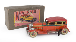 "NEW NASH" wind-up four-door sedan in orginal box with largely intact top label; circa 1930s Japan; by ET Co. Length (of car): 15.5cm (7.75").