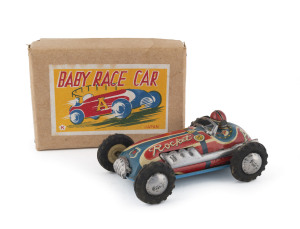 Friction powered tin "Baby Race Car" marked "Rocket" in original box with top label; by Kokyu Trading Co., Japan.